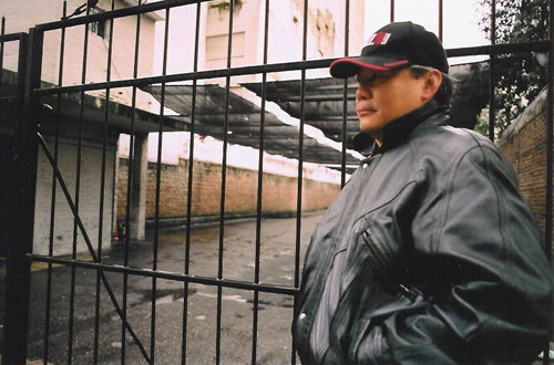 Cheuk in a street