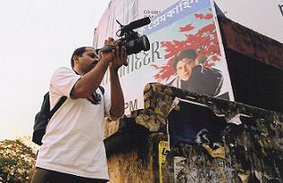 Ajay shooting at billboard